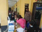 Tanpa Antrian, Tahfiz Alquran Tunanetra Vaksin Covid-19 di Mapolsek Medan Timur