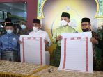 MTQ Ke-38 Sumut, Gubsu dan Wagubsu Tuliskan Kata Awal Juz Alquran di Mushaf