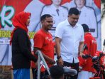 Senangnya Warga Amplas dapat Doorprize Sepeda Listrik dari Bobby Nasution