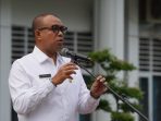 Pj Bupati Langkat Faisal Hasrimy Pimpin Apel Gabungan Perdana