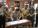Wali Kota Binjai Menandatangani NPHD Pilkada